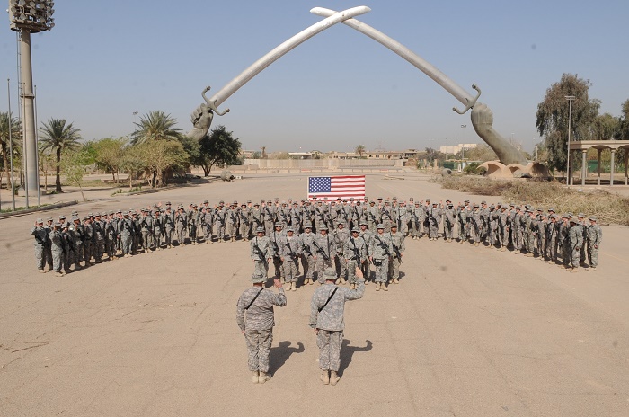 DVIDS - News - Soldiers re-up under Crossed Swords monument